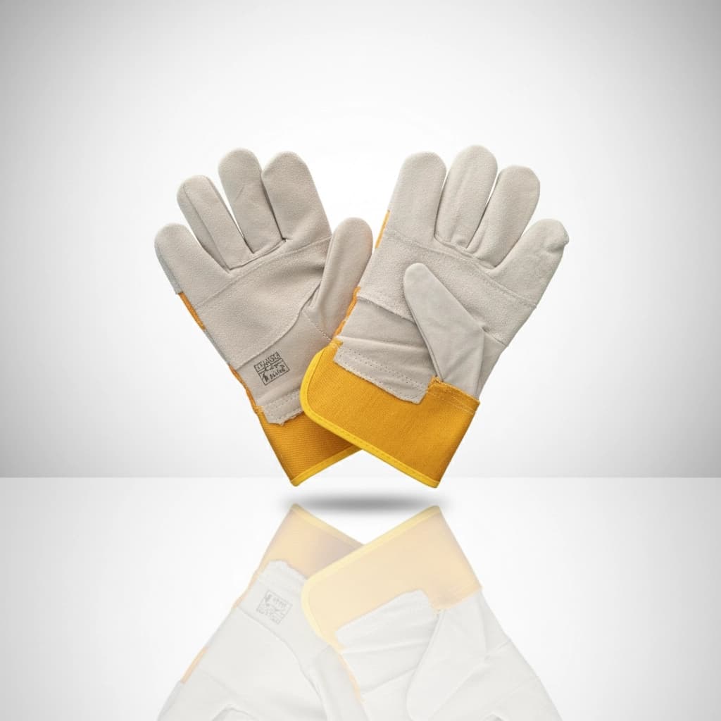 Close-up of durable work gloves on a workbench, showcasing reinforced stitching and comfortable fit.